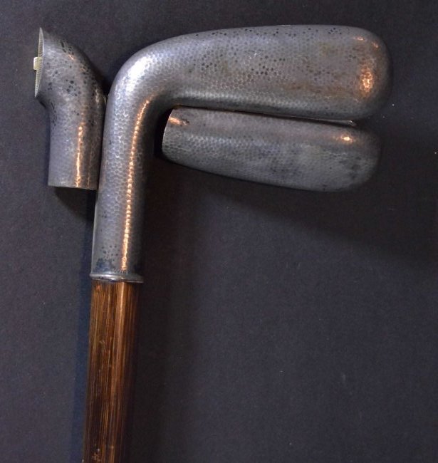 Golf Sunday Stick Cane, Mechanical, c1880: Description: A golfing Sunday stick, with a sterling head and nickel ferrule, coconut wood shaft, the head is sterling. Sunday stick is also a cane/ walking stick with a cigarette and match holder. Ma