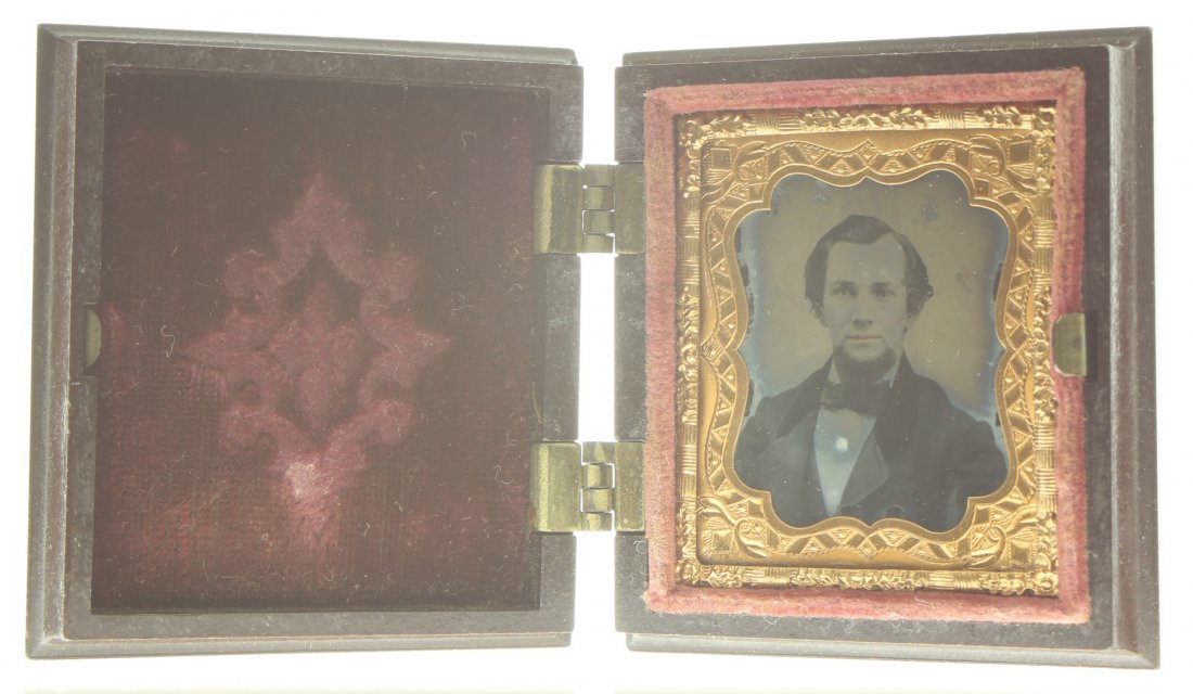 1/16 plate ambrotype: Description: Plate Size: 1/16 platePhoto type: AmbrotypePhotographer: Unknown Hand Coloration: noneSubject Matter: ManCase Name: Basket of Fruits & VegetablesCase Type/Maker: Holmes, Booth & Hayden, P