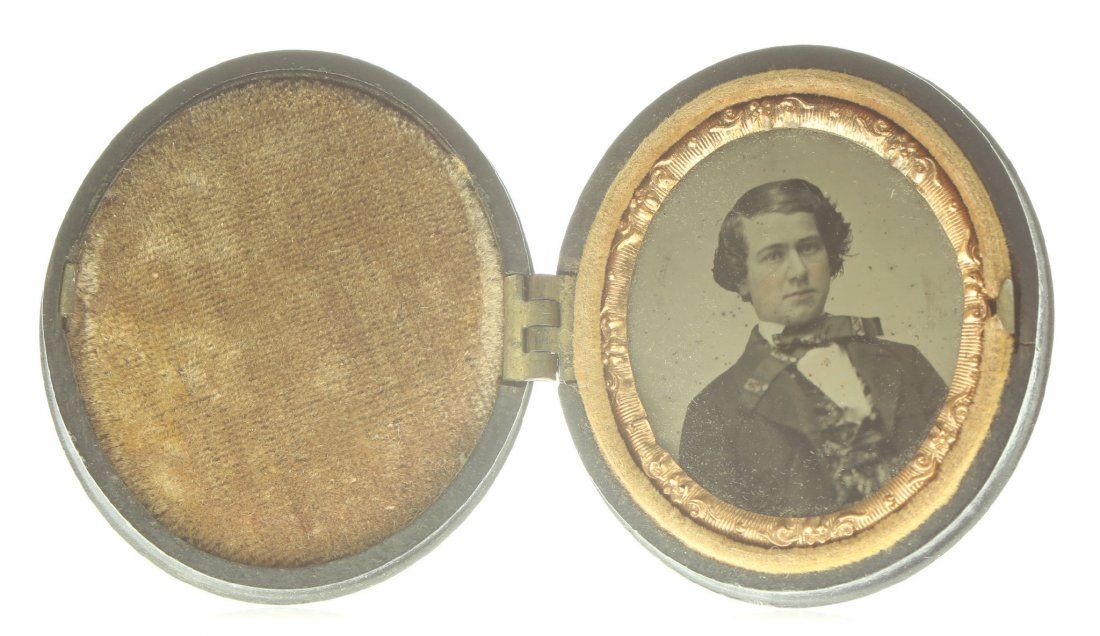 1/16 oval plate ambrotype: Description: Plate Size: 1/16 platePhoto type: AmbrotypePhotographer: Unknown Hand Coloration: Cheeks/giltSubject Matter: ManCase Name: Floral MotifCase Type/Maker: UnknownDate of image: C. 1860Condit