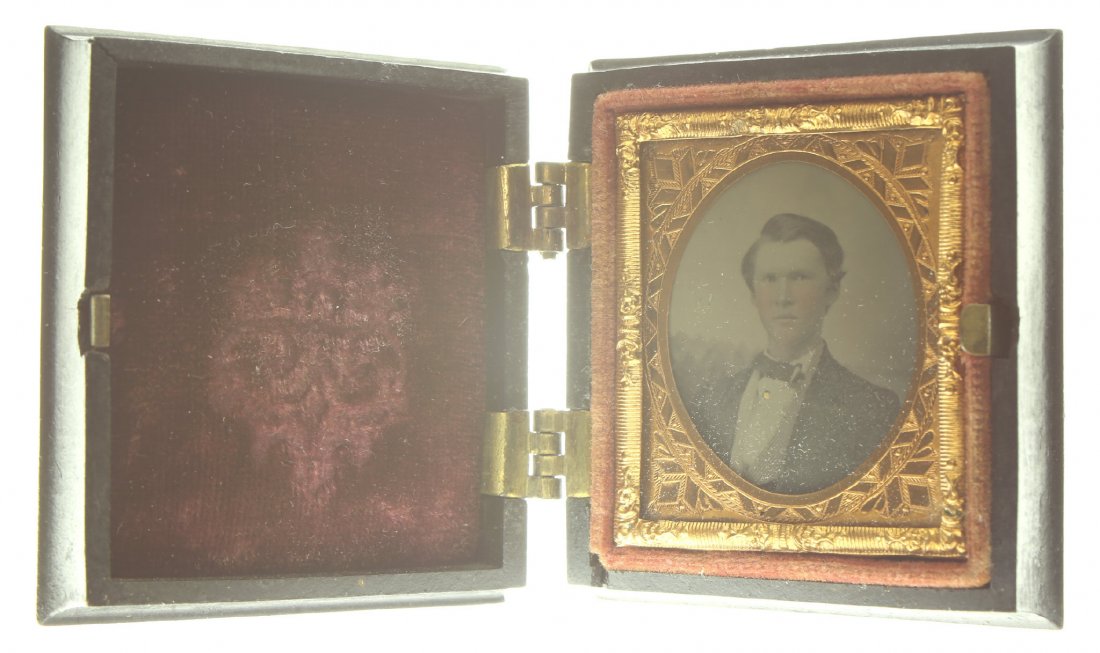 1/16 plate ambrotype: Description: Plate Size: 1/16 platePhoto type: AmbrotypePhotographer: Unknown Hand Coloration: Cheeks/giltSubject Matter: ManCase Name: Floral MotifCase Type/Maker: Littlefield, Parsons & Co., Plastic