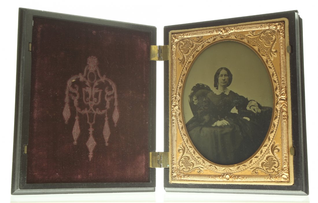 1/4 plate ambrotype: Description: Plate Size: 1/4 platePhoto type: AmbrotypePhotographer: Unknown Hand Coloration: Cheeks/giltSubject Matter: Woman seatedCase Name: Gypsy Fortune TellerCase Type/Maker: A. P. Critchlow & C