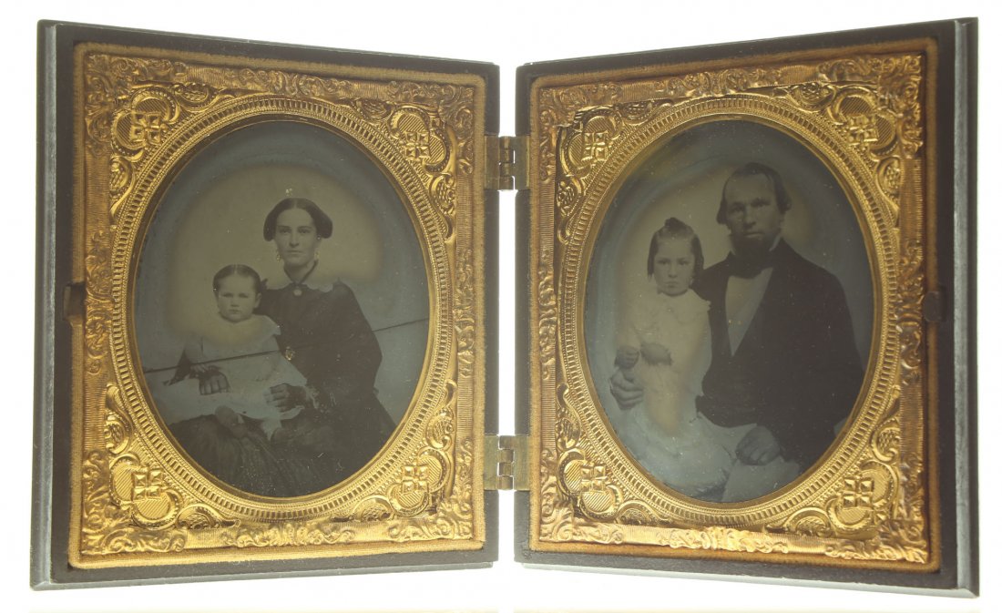 1/6 pair of plate ambrotype: Description: Plate Size: 1/6 pair of platesPhoto type: AmbrotypePhotographer: Unknown Hand Coloration: noneSubject Matter: Woman, baby, man, childCase Name: Bobby ShaftoCase Type/Maker: A. P. Critchlo