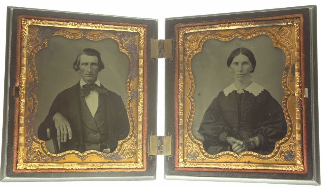 1/6 pair of plates, ambrotype: Description: Plate Size: 1/6 pair of platesPhoto type: AmbrotypePhotographer: Unknown Hand Coloration: Cheeks/giltSubject Matter: Man and womanCase Name: The Berry MotifCase Type/Maker: S. Peck & Co.,