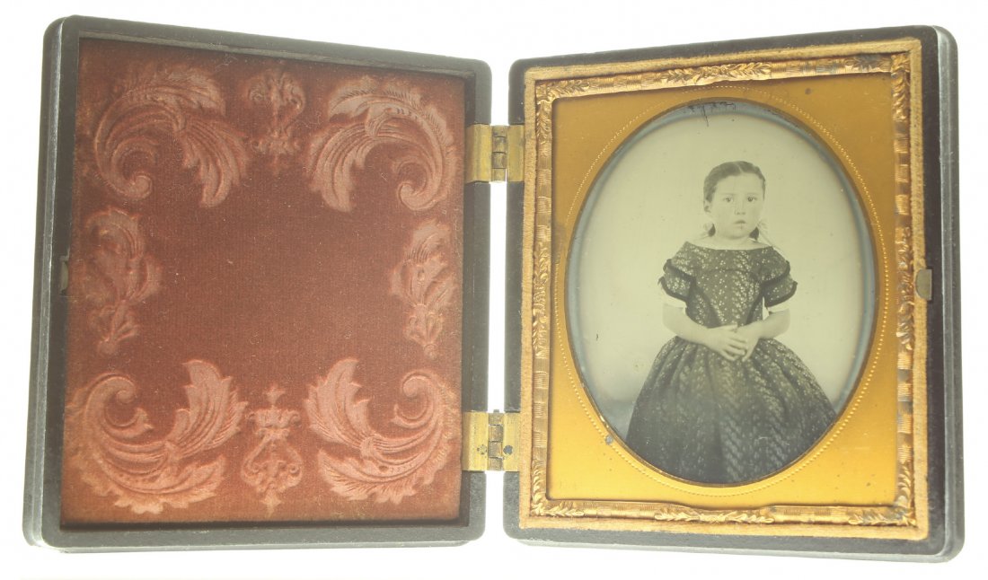 1/6 plate ambrotype: Description: Plate Size: 1/6 platePhoto type: AmbrotypePhotographer: Unknown Hand Coloration: noneSubject Matter: Little girlCase Name: Assorted Fruits and FlowersCase Type/Maker: S. Peck and Co., Pla