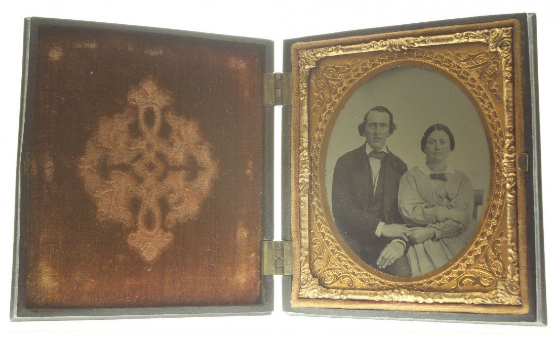 1/6 plate ambrotype: Description: Plate Size: 1/6 platePhoto type: AmbrotypePhotographer: Unknown Hand Coloration: noneSubject Matter: Couple seatedCase Name: Tray of FruitsCase Type/Maker: Holmes, Booth & Hayden, Plastic