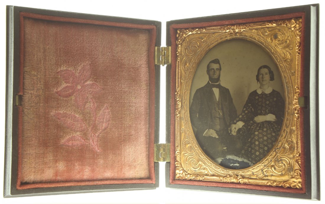 1/6 plate ambrotype: Description: Plate Size: 1/6 platePhoto type: AmbrotypePhotographer: Unknown Hand Coloration: Cheeks/giltSubject Matter: Couple seatedCase Name: Moorish DesignCase Type/Maker: A. P. Critchlow & Co., P