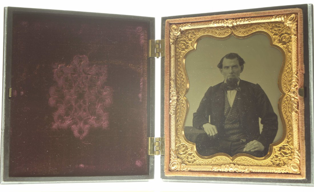 1/6 plate ambrotype: Description: Plate Size: 1/6 platePhoto type: AmbrotypePhotographer: Unknown Hand Coloration: Cheeks/giltSubject Matter: Man seatedCase Name: Floral MotifCase Type/Maker: Littlefield, Parsons & Co., P