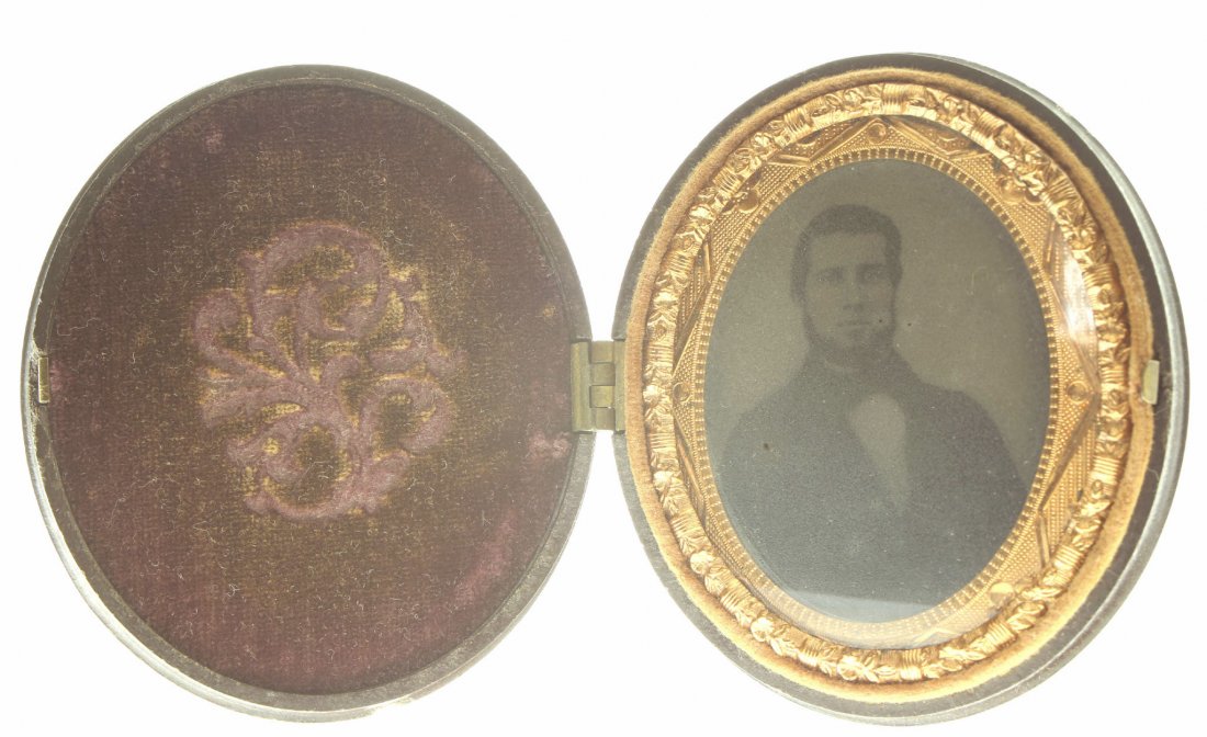 1/9 oval plate ambrotype: Description: Plate Size: 1/9 oval platePhoto type: AmbrotypePhotographer: Unknown Hand Coloration: noneSubject Matter: ManCase Name: Assorted FruitsCase Type/Maker: Littlefield, Parsons & Co., Plastic