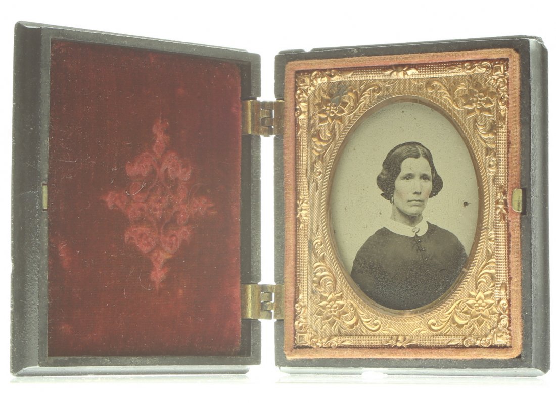 1/9 plate ambrotype: Description: Plate Size: 1/9 plate" Photo type: Ambrotype Photographer: Unknown Hand Coloration: Cheeks/gilt Subject Matter: Woman Case Name: The Blind Beggar Case Type/Maker: Littlefield Parsons & C
