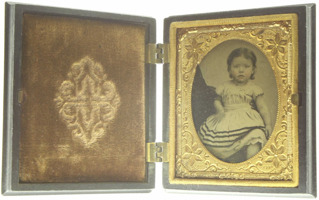 1/9 plate ambrotype: Description: Plate Size: 1/9 platePhoto type: AmbrotypePhotographer: Unknown Hand Coloration: Cheeks/giltSubject Matter: Baby girlCase Name: Grapes MotifCase Type/Maker: Littlefield, Parsons & Co., Pl