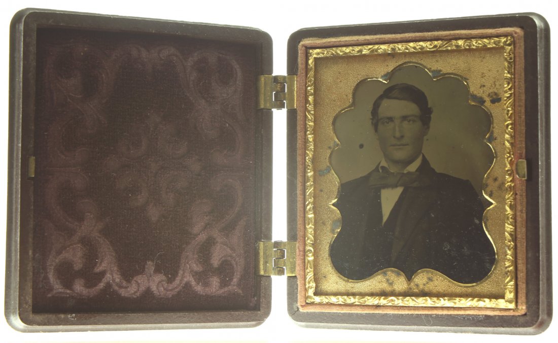 1/9 plate ambrotype: Description: Plate Size: 1/9 platePhoto type: AmbrotypePhotographer: Unknown Hand Coloration: Cheeks/giltSubject Matter: ManCase Name: Floral MotifCase Type/Maker: Littlefield, Parsons & Co., Plastic,