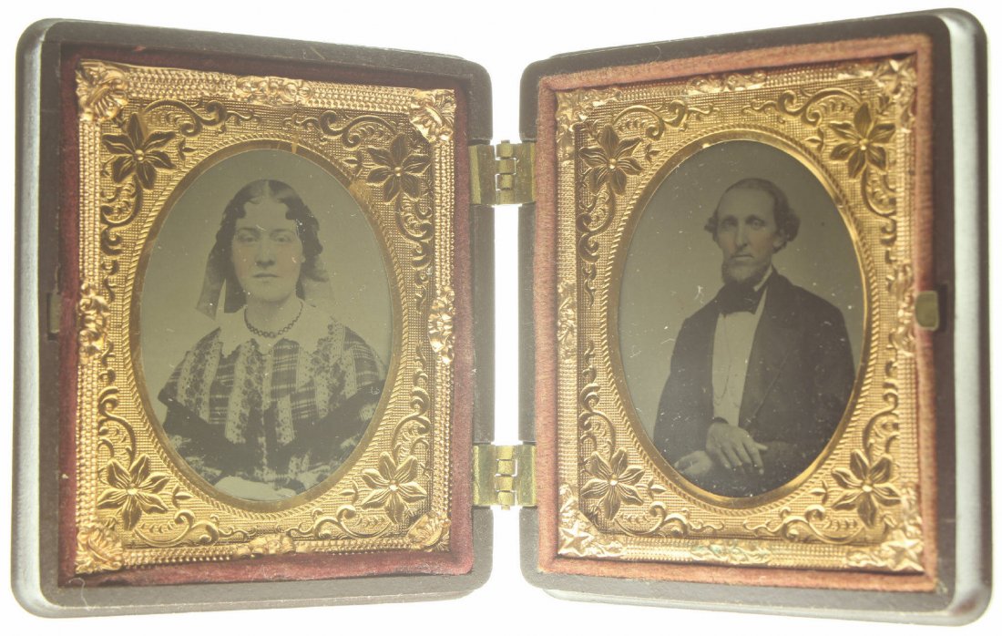 1/9 plate ambrotype: Description: Plate Size: 1/9 platePhoto type: AmbrotypePhotographer: Unknown Hand Coloration: Cheeks/giltSubject Matter: Woman and manCase Name: Floral MotifCase Type/Maker: Littlefield, Parsons & Co.