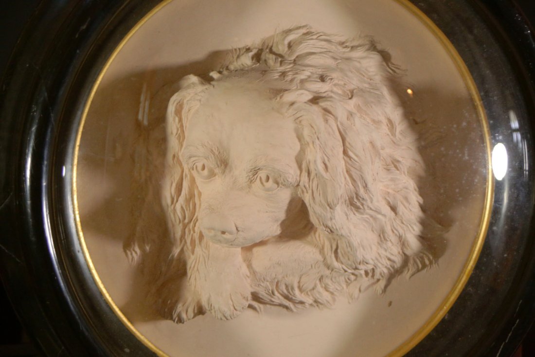 Portrait, Spaniel, Royal Academy 1867: Description: This work is listed in the Royal Academy exhibitions in 1867. A terra cotta sculpture of a blenheim-coloured Cavalier, King Charles Spaniel. Entitled 'Blenheims Head' by the modeller (scu