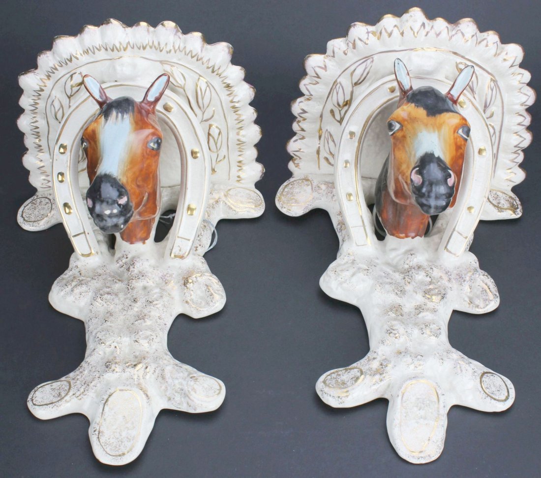 Wall Brackets, 2 Horse Head, Staffordshire, 1860s: Category: Pottery And Porcelain Description: This pair of wall bracketing shelves take the shape of horse heads within a horseshoe. The shelving and horseshoe are white with gilt applied. The molded h