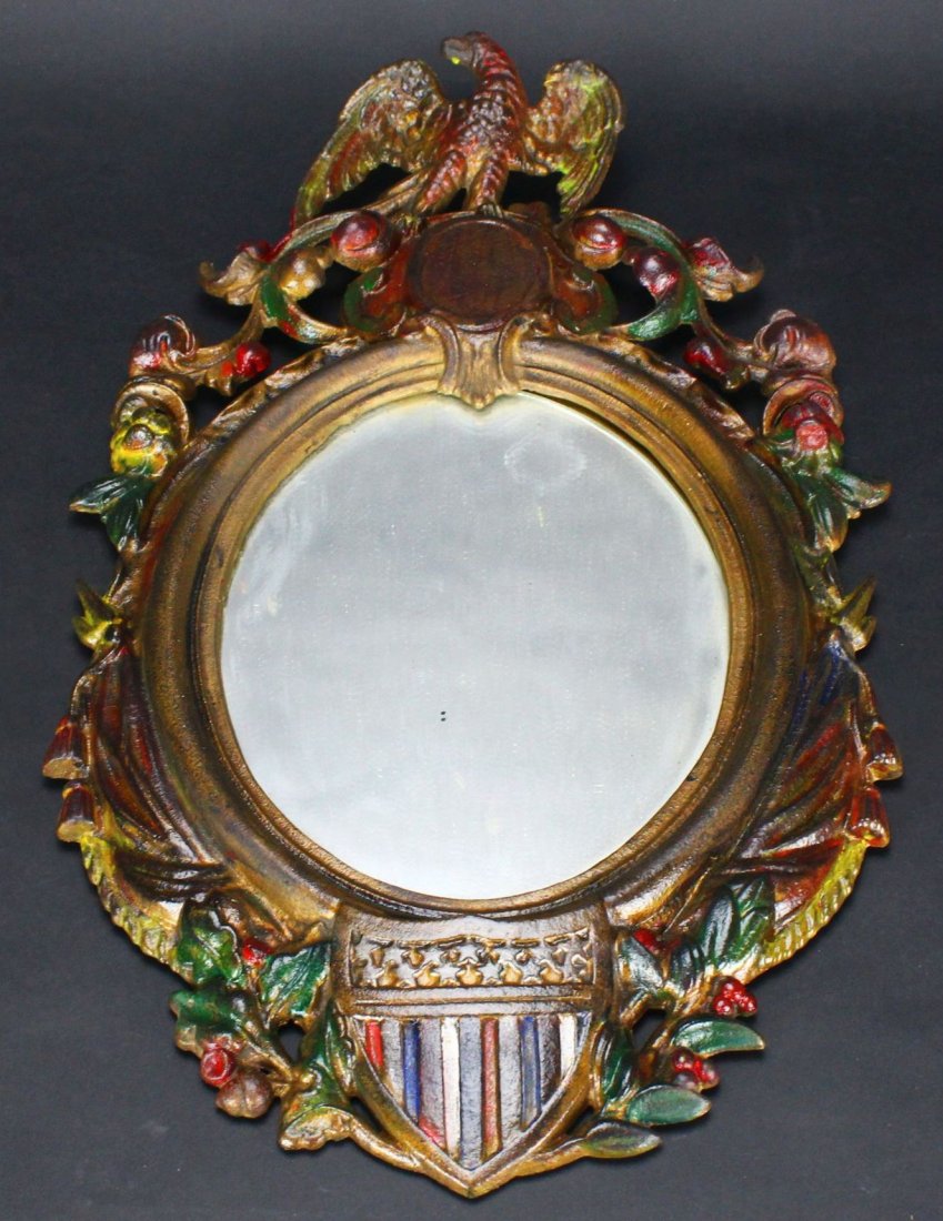 Mirror, Bronze Frame, Eagle, 1862: Category: Mirrors Description: A cast-iron patriotic design mirror having an eagle at the top and shield at the bottom with 13 stars. Patent dated on the reverse November 25, 1862. Now fitted with a c