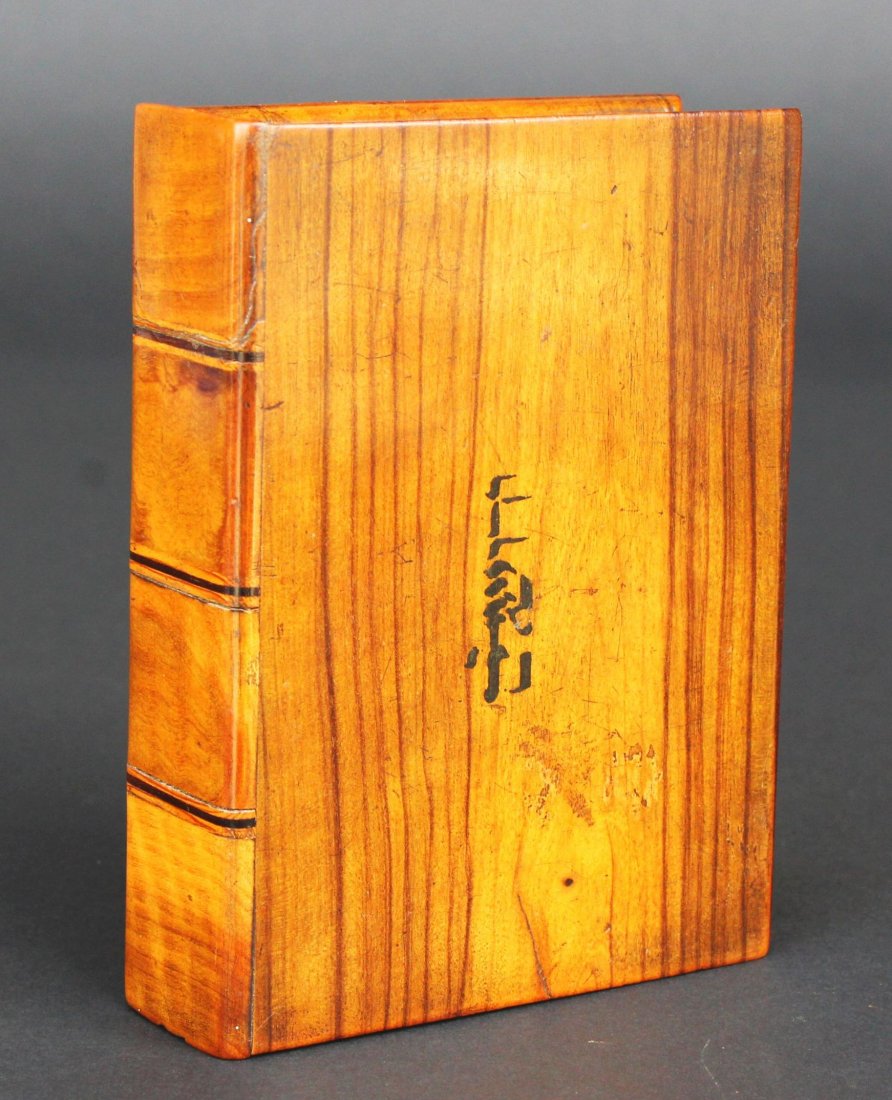 Middle Eastern Puzzle Box: Antique and Collectables Category: Boxes Description: Wood puzzle box in the form of a book with writing on the front. Material: Wood Maker/Artist: Date: 20th c. Provenance: Whitenack Estate Naples, F