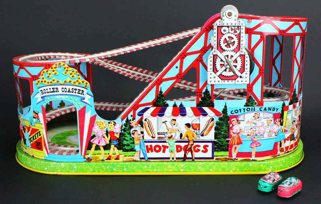Chein Toys, Rollercoaster, Tin: Antique and Collectables Category: Toys Description: This toy rollercoaster is primarily red and gray with a green and blue patterned base to mimic a park ground with a duck pond. It winds up to pull