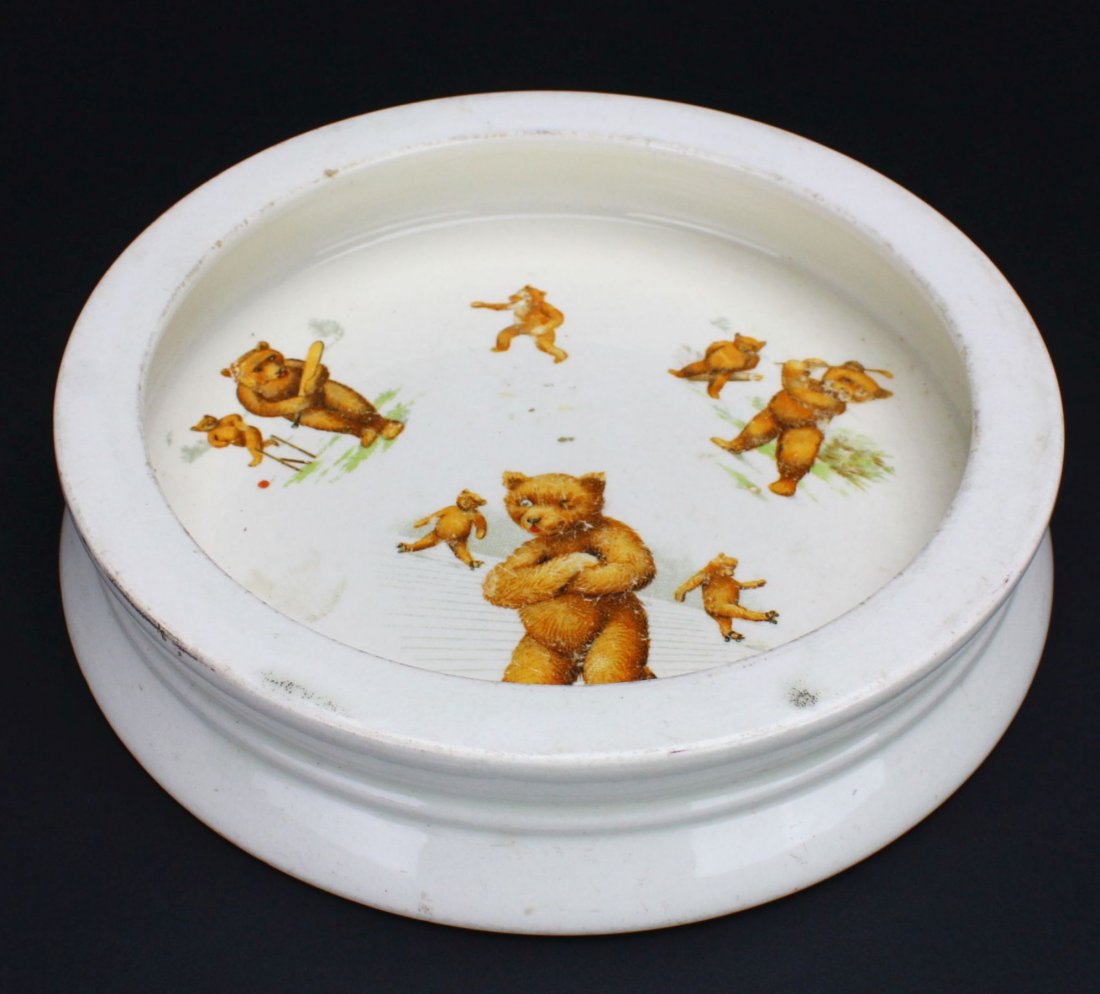 Baby's Plate Golf, C. 1910: Antique and Collectables Category: Sports Description: Sports theme with roller skating, cricket and golfing bears printed onto the plate. Material: Stoneware Maker/Artist: Unknown Date: C. 1910 Prove