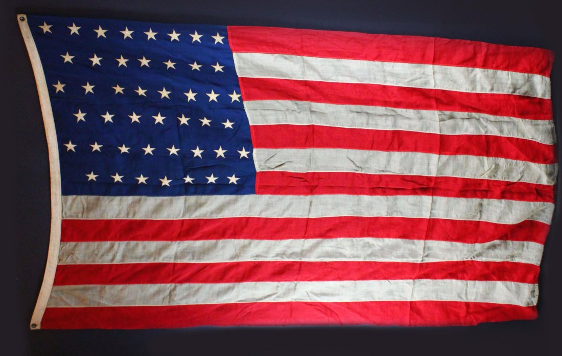 45 Stars American Flag (57" x 91"), 1896-1907: Antique and Collectables Category: Holiday And Patriotic Description: 1. 45 Stars American flag sewn wool, stamped "U.S. Standard- 5 x 8" and inscribed "Bell" twice on the hoist; circa 1896-1907. Mate
