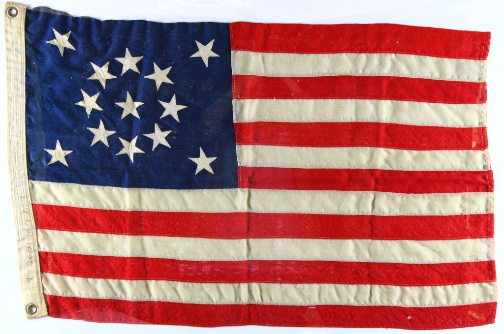 Flag with Medallion Pattern, American, 1876: Antique and Collectables Category: Holiday And Patriotic Description: 1. (13) Star Flag with Medallion Pattern, framed. This pattern was prevalent during the American Centennial celebrations of 1876. 