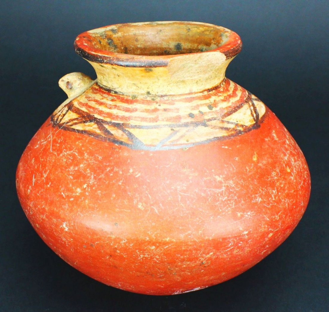 Mayan Jar, Polychrome Decorated, c. 600 C.E.: Antique and Collectables Category: Pre-Columbian Description: This vessel is a rich red-brown with cream and black to create a patterning along the mouth. There is a small turtle's head poking out fro