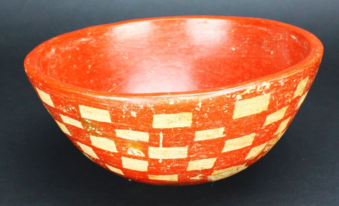 Bowl, Chupicuaro, Mexico 800-1100 A.D.: Antique and Collectables Category: Pre-Columbian Description: This bowl has been painted an earthy red and checkered with cream along the outside. The base is rounded rather than flat, but achieves it
