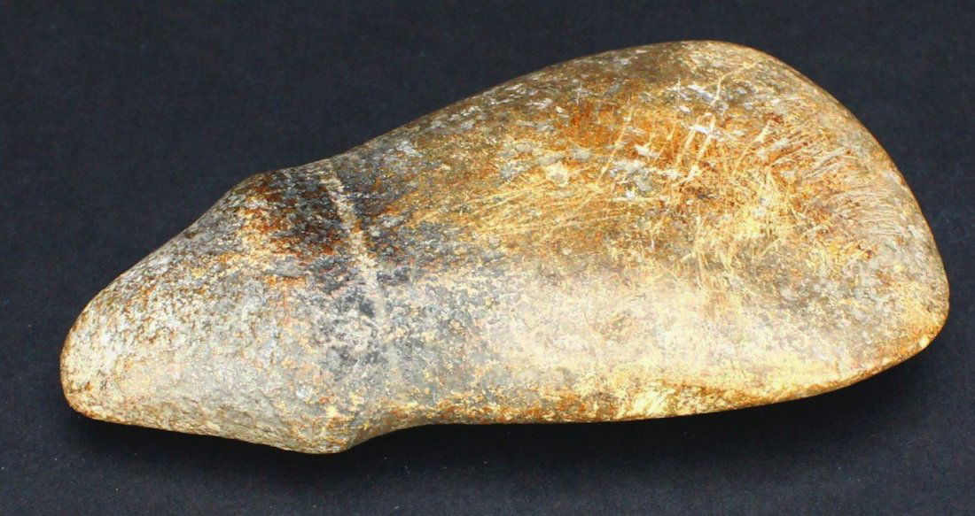Axe Head, Stone, Unknown Age: Antique and Collectables Category: Ancient Artifacts Description: This carved stone was shaped to be a tool or weapon, affixed to a haft and used as a chopping or hammering instrument. Material: Stone
