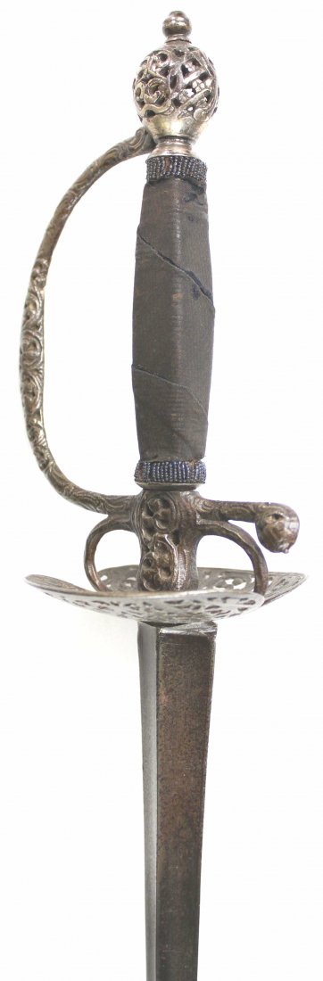 Rapier, Iron, 18th century: Antique and Collectables Category: Swords Description: Blade: triangular shaped, spear point Blade length : 30 1/2 inches Markings: none Fuller: deep fullers on each side Cross guard: clam shell guard