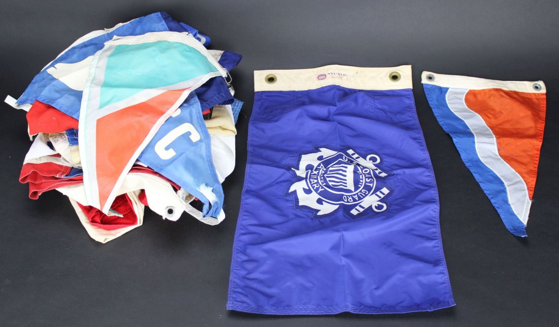 Flags(25), Assorted Nautical: Antique and Collectables Category: Nautical Description: A collection of nautical flags some wool most nylon dating from the 20th century. The best an American flag and banner company US Coast Guard E