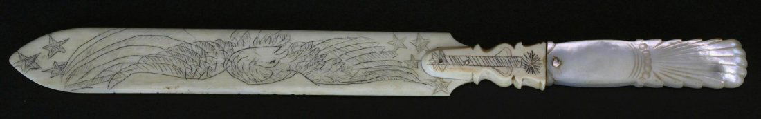 Letter Opener, Engraved Ivory and Mother of Pearl: Description: Antique Victorian letter opener, which has a carved mother of pearl handle and scrimshaw designs on both sides of the bone blade. One side is an American Eagle with stars, the other a pea