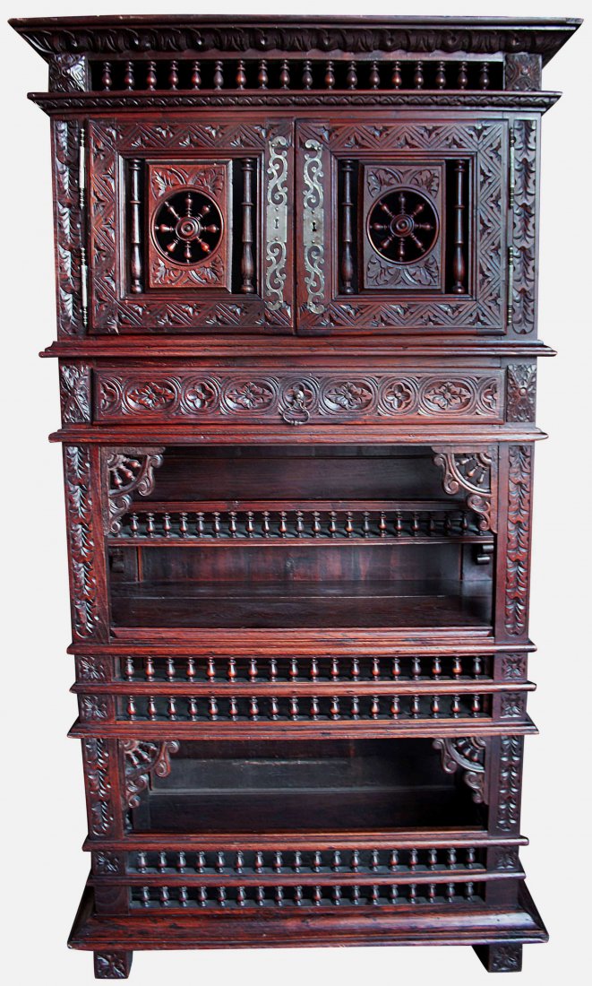 Whatnot Cabinet, 19th century: Description: Fanciful cabinet having galleried rails and ship's wheel style decorated doors, crown molding and more. History: A what-not is a piece of furniture derived from the French Ã©tagÃ¨re, 