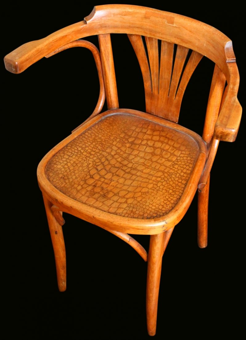 Bentwood Armchair, Thonet Style, c.1880-1910: Description: Bentwood armchair, in the style of Michael Thonet, beechwood, c.1880-1910. Often referred to as the "coffee house" armchair. Fan back detailing and wood seat embossed in an alligator skin