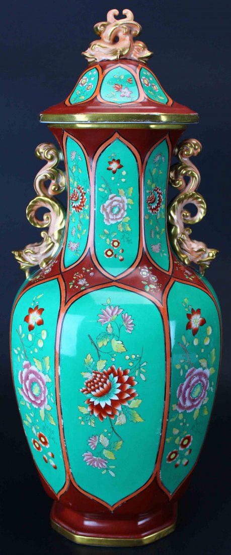 Rare Mason's Ashworth Covered Vase: Description: This large, 19.5" high vase with lid was made by Mason's Ashworth. The vase is decorated in a forest green background with iron red diamond shaped borders. The center of each panel is fil