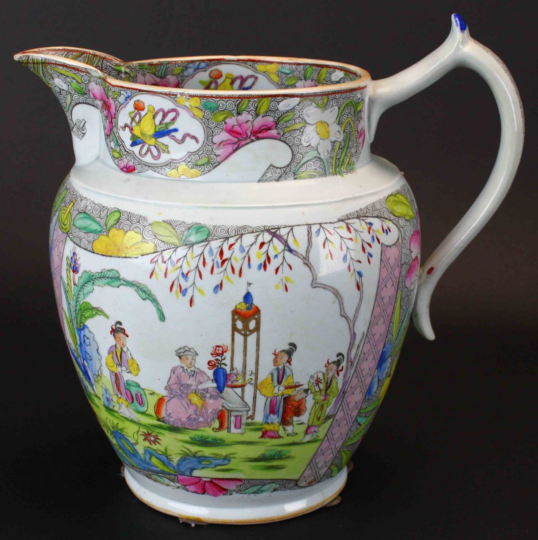 Jug, Mason's Pink Scroll, C. 1815-20: Description: A finely scaled Chinoisserie study appears on an unfurled scroll lying on a fine patterned green ground. Reserves of Chinese treasures and florals form the pitcher's border. Pink, green, 
