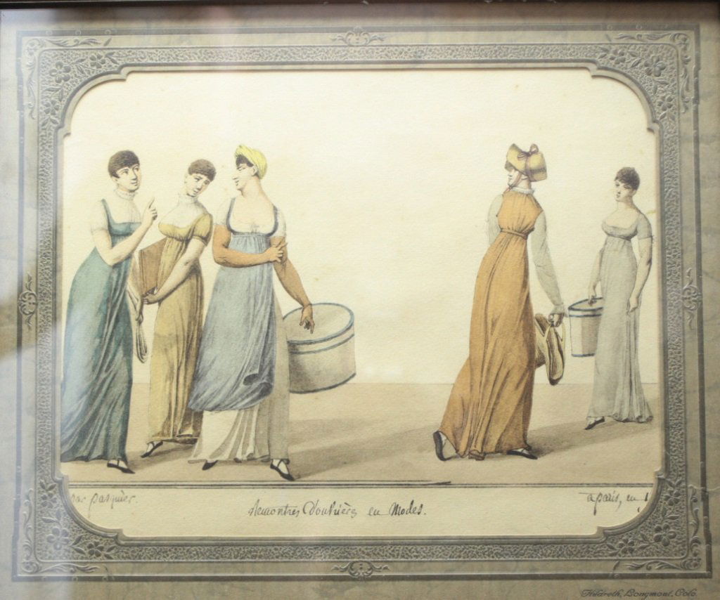 Lithograph, French Fashion: Description: Watercolor on paper painting. Lithographs portrays a framed print of girls with hatboxes socializing, Paris, c. 1820. History: n/a Provenance: Patricia & Dennis Della Penta estate Dimensi