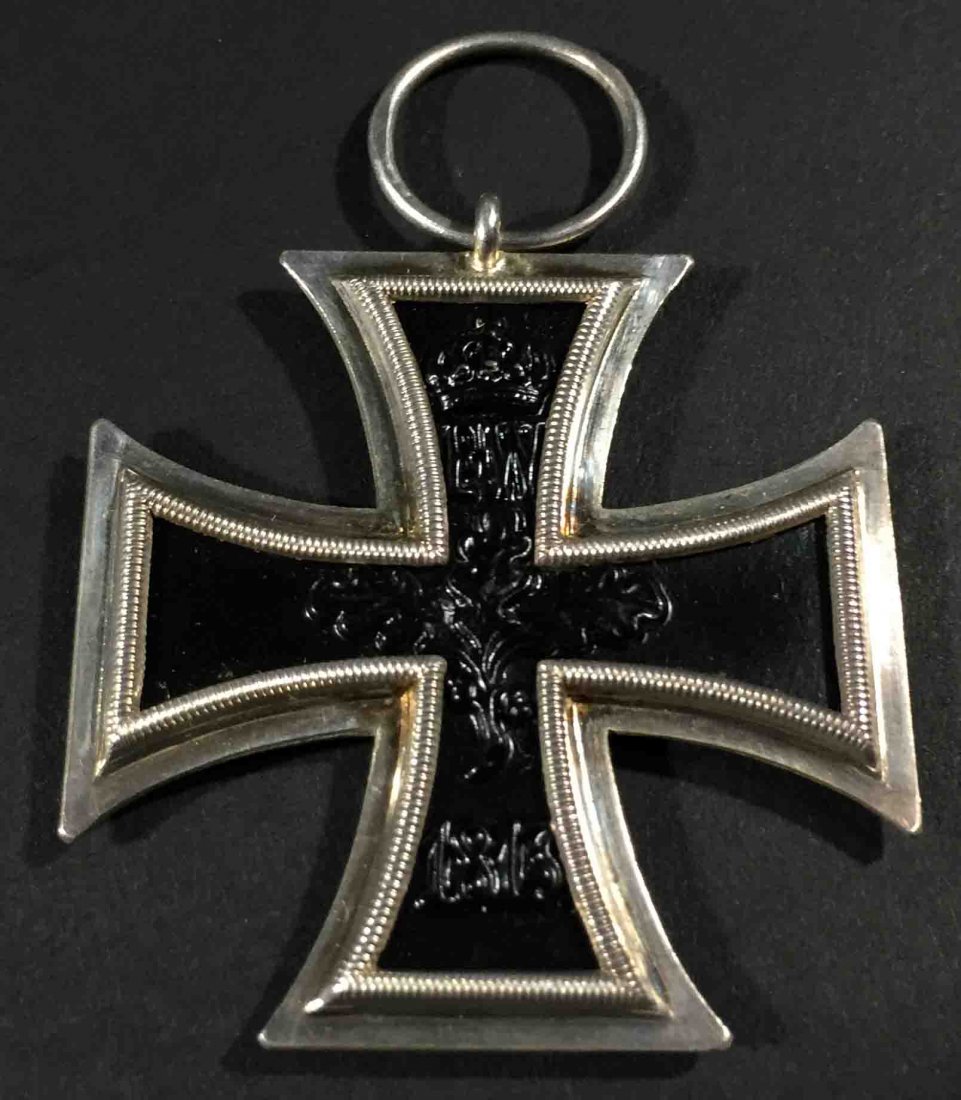 Imperial German W.W. I 1914 Iron Cross 2nd Class: Description: World War I Imperial German Iron Cross second class. The German Iron Cross is the most recognized valor medal in the entire world.This example is ring stamped "W II M", for an unknown mak