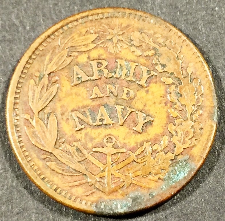 Token, Civil War, Army and Navy, 1863: Description: One cent piece, the insignia of the flag of the Union on one side and the words"Army and Navy" on the reverse. History: The American Civil War, widely known in the United States as simply