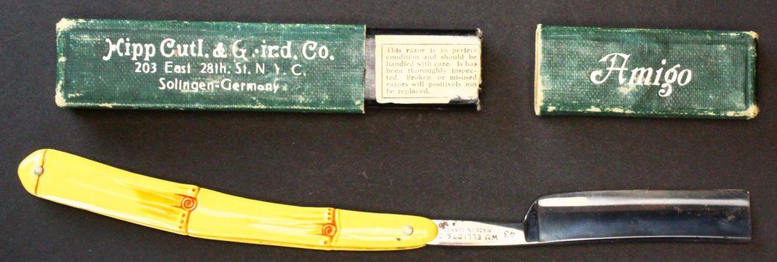 Wm. Elliot & Co.,Razor, Celluloid Bone Shaped: Description: This straight razor is marked on the tang with "Wm. Elliot & Co." and "Made in Germany." The handle is made of celluloid and shaped to look like bone with yellow and red detailing. Histor