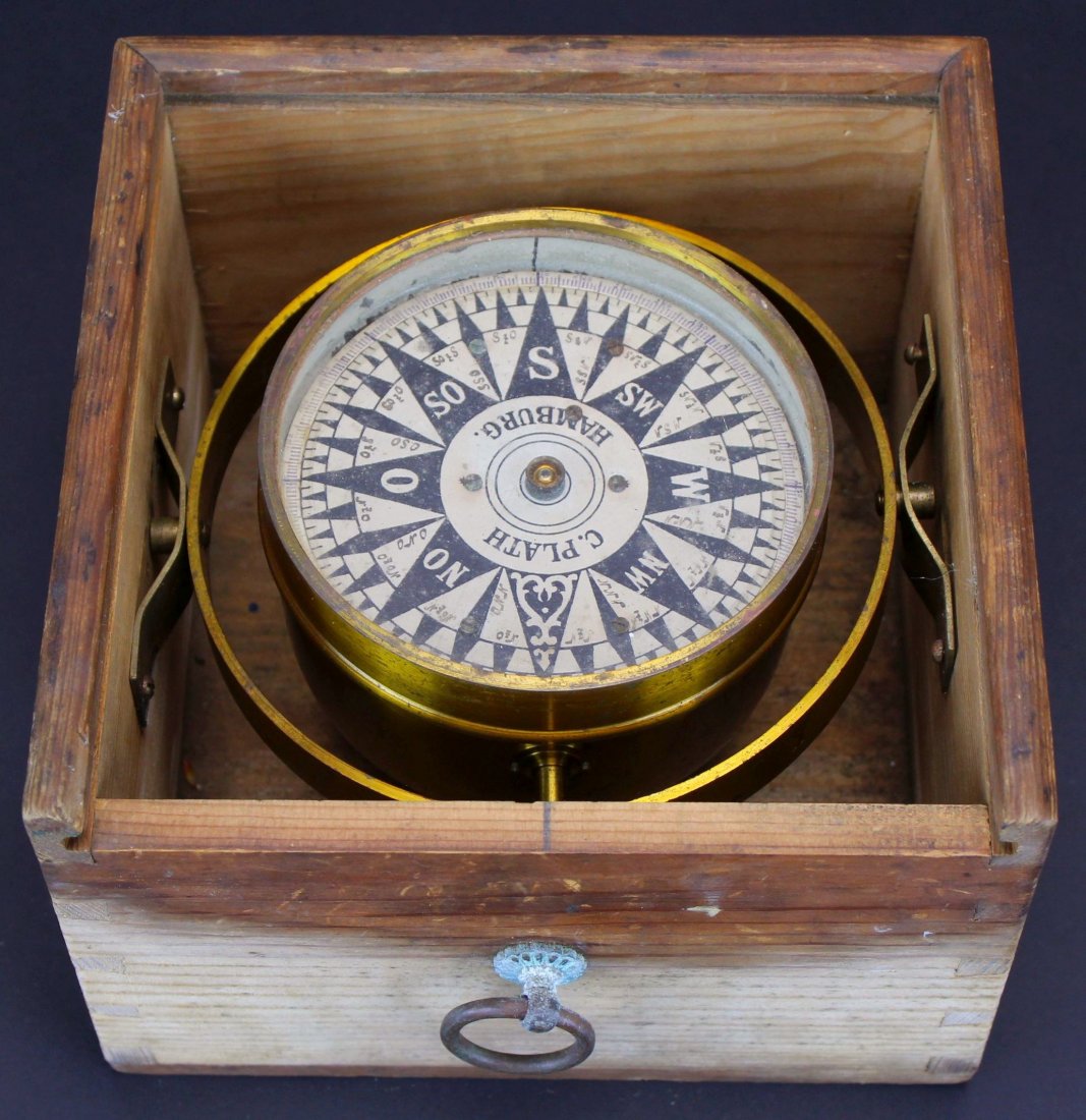 Compass, Dry Card, C. Plath, Pine Box w/Lid: Description: Dry card compass marked C. Plath, Hamburg housed in the original pine box with dovetailed corners. N, S, O(E) and W marked on the card along with hand inscribed points between. History: T