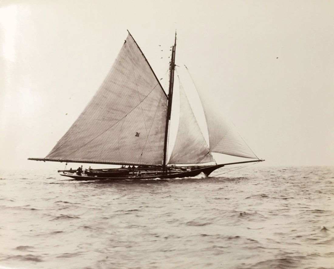 Photograph, Sloop Yacht, Katrina, C. 1890: Description: This photograph depicts the Sloop Yacht, "Katrina" at sea with sails at full mast. The seas are relatively calm with a stiff breeze evidently pulling the yacht along the waves. History: A