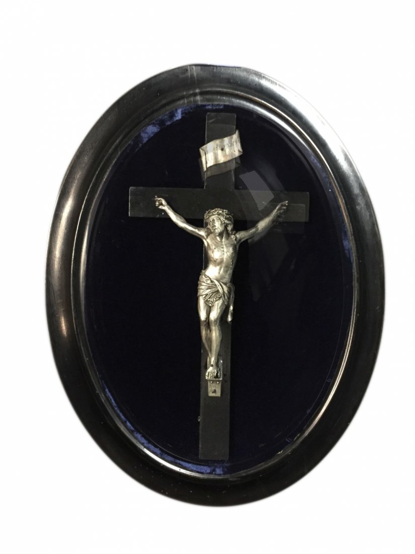 Crucifix, Silver (?), Convex Frame, C. 1900: Description: Casting of Jesus on ebonized wood cross with INRI above his head. This mounted on velvet with pine backer board. Frame is ebonized wood and it retains the original convex glass creating a