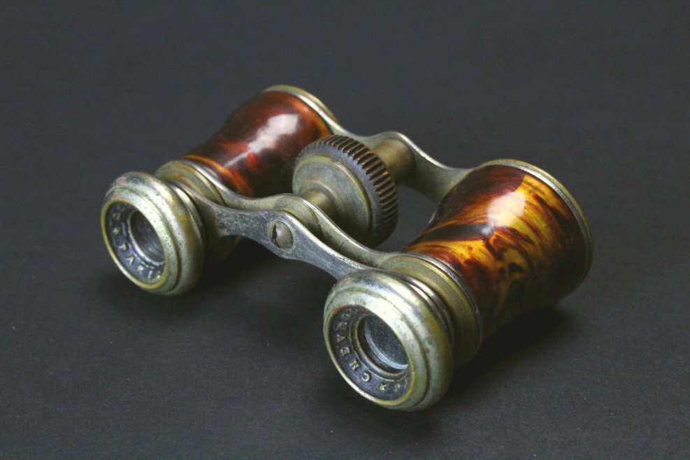 Brass and Celluloid, Chevalier, Paris: Description: A brass and celluloid pair of unusual opera glasses. The framework and eye pieces are brass with nickel plating. Hallmarked eye pieces with, "Chevalier, Paris". The bottom side of the fra