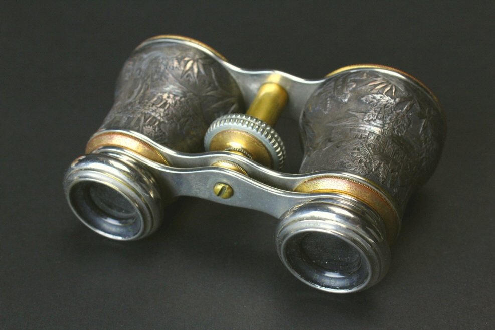 Brass and Pewter, Reine, Paris, Outdoor Scenes: Description: A pair of cast brass and pewter opera glasses. The barrels are decorated with outdoor scenes of couples. Nice rainbow patina. The eye pieces are hallmarked, "Reine Paris". History: Opera 