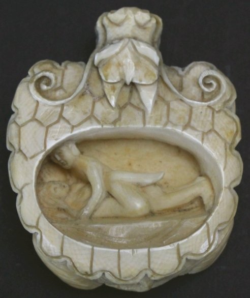 Netsuke Carved Erotica In Dragon: Description: A finely carved ivory dragon chamber. A bed for lovers inside. History: Netsuke are miniature sculptures that were invented in 17th-century Japan to serve a practical function, (the two J