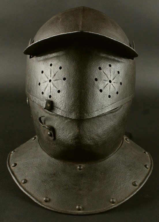 Burgonet Helmet, 19th Century: A "close" helmet, Victorian era reproduction (circa 19th century), also called the close helm. A fully enclosing helmet with a pivoting visor and integral bevor. Upward pivoting visor with wide eye sl