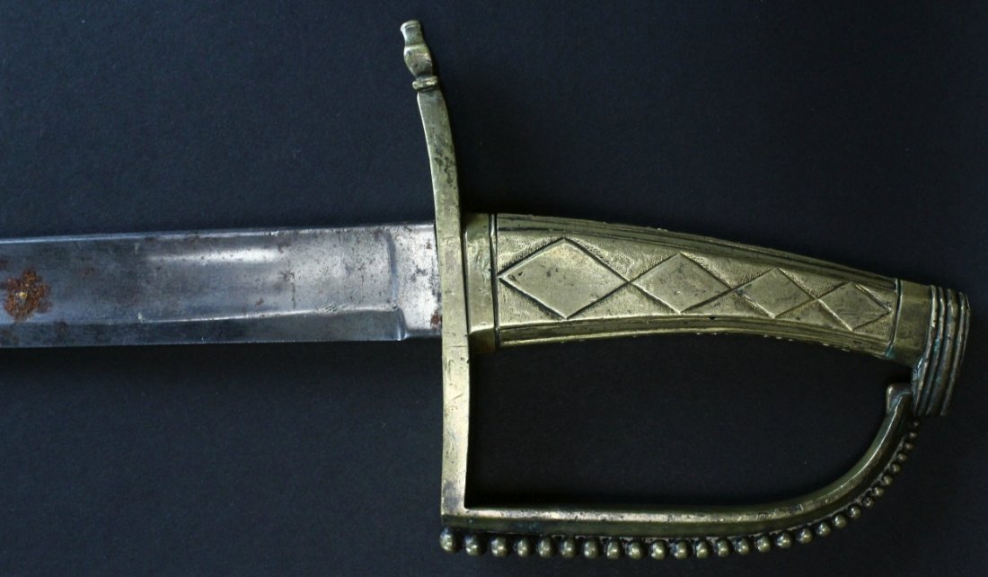 Short Sword,French Napoleonic War, Circa 1805: French Napoleonic brass short sword. Single-edged, with one large fuller.