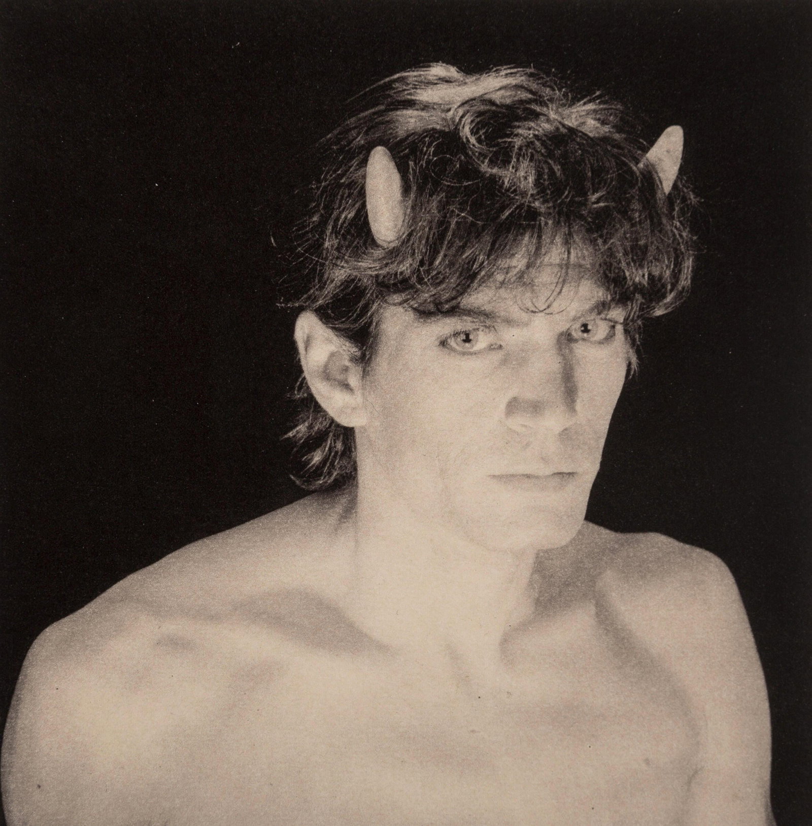 Robert Mapplethorpe, Self-Portrait, A Season in Hell, Limited Edition Photogravure: Photogravure on papier gravure Cartiere Enrico Magnani a la main, mounted on papier Cartiere Enrico Magnani a la main moule-presse paper, as issued. Paper Size: 11.5 x 7.75 inches; Photogravure size:
