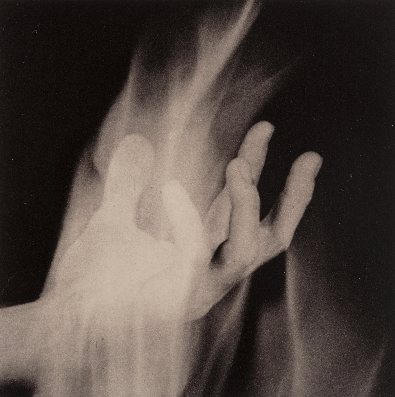 Robert Mapplethorpe, Hand in Fire, A Season in Hell, Limited Edition Photogravure: Photogravure on papier gravure Cartiere Enrico Magnani a la main, mounted on papier Cartiere Enrico Magnani a la main moule-presse paper, as issued. Paper Size: 11.5 x 7.75 inches; Photogravure size: