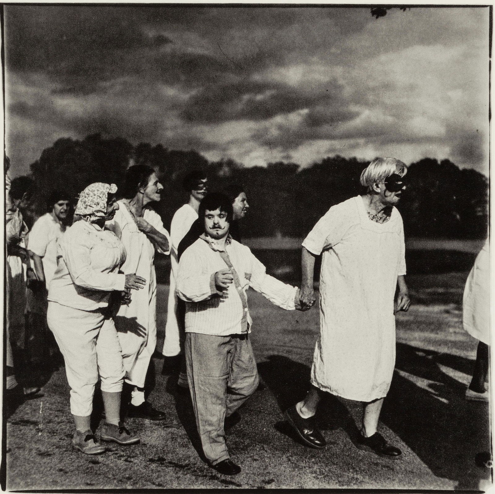 Diane Arbus, Composition, Diane Arbus, Electa Editrice Portfolios, Limited Edition Heliogravure: Heliogravure on velin paper. Paper size: 15.75 x 11.75 inches. Excellent condition. Inscription: unsigned and unnumbered, as issued. Notes: From the folio, Diane Arbus, Electa Editrice Portfolios,