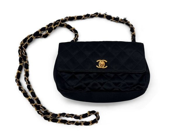 Chanel Vintage Silk Quilted Crossbody Purse: Vintage Chanel with a silky twist-quilted texture, crossbody ease, and that timeless Parisian energy. It is light, elegant, and perfectly sized for nights when you only need the essentials and a littl